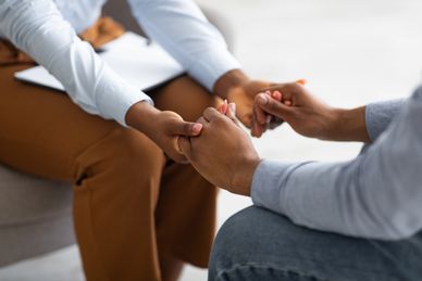 two people holding hands