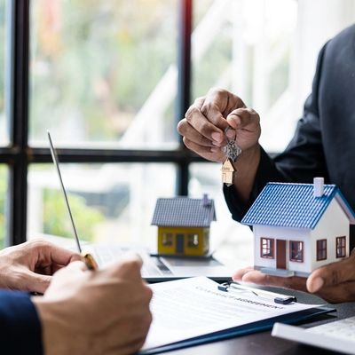 Real estate agents offer contracts and interest rates to buy or rent a residence. 