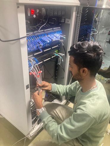 Networking Rack Dressing one of our Technical person.