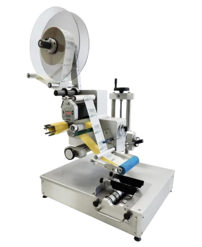 Labeling machine with roll of labels.