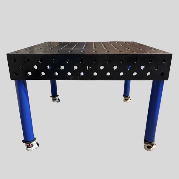 Work table with perforated black top and blue legs.