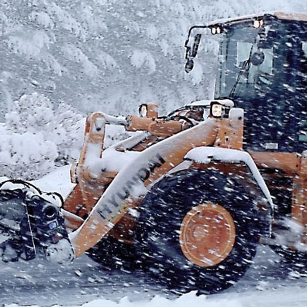 Loading moving snow in snow storm