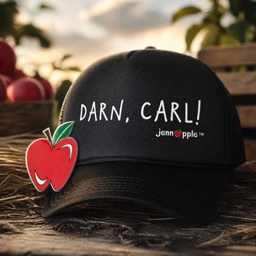 Black cap with the phrase 'DARN, CARL!' and a red apple pin attached.