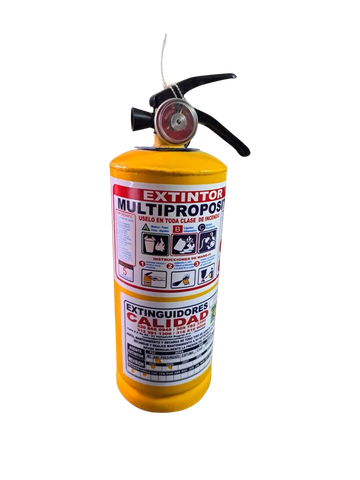 Extintor multipropósito amarillo con instrucciones.