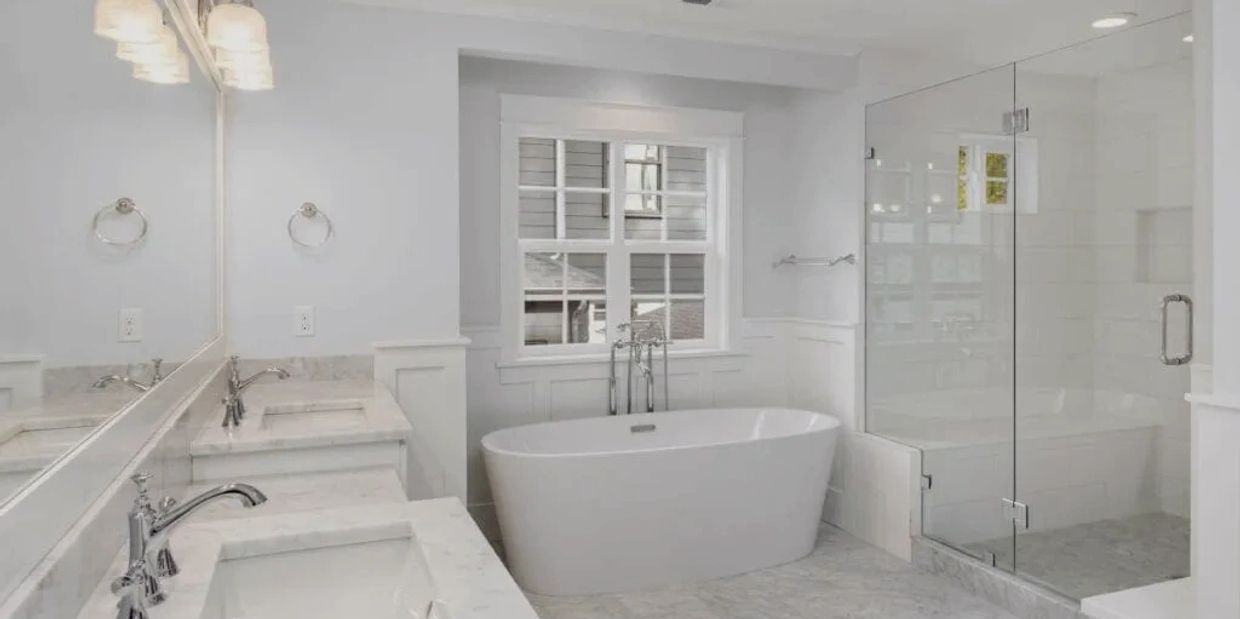 Tiled bathroom with a walk-in shower