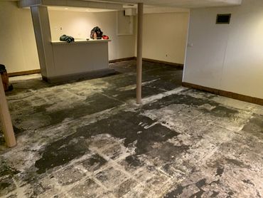 What the floor looked like after we removed the carpet