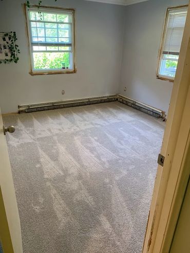 Ripped up old carpeting and installed new carpeting, trim and baseboard heating covers.  Windsor Loc
