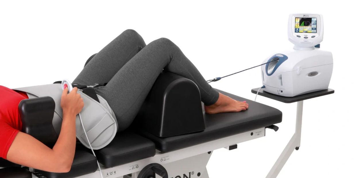 Spinal traction therapy for disc relief, decompression, pain reduction, and improved mobility.