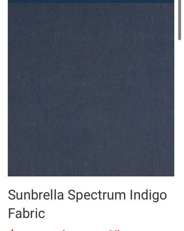 Swatch of Sunbrella Spectrum Indigo fabric in deep blue shade.