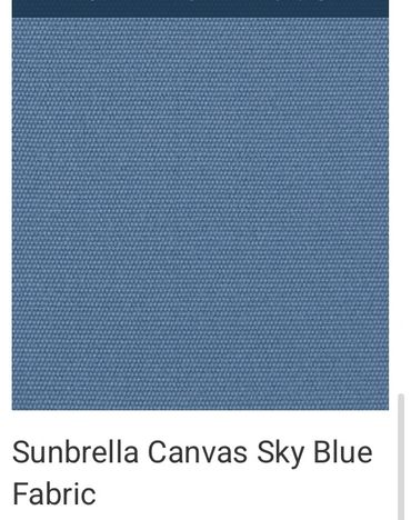 Close-up of Sunbrella Canvas fabric in sky blue color.