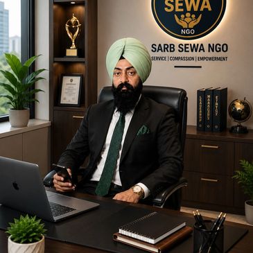 Professional man in a turban at Sarb Sewa NGO office, symbolizing leadership and service.