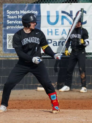 Baseball player from the Tornados team preparing to bat during a game.