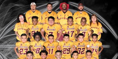 Youth football team in yellow jerseys posing for a group photo.