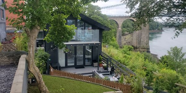 Holidaylet property on the side of Menai Strait