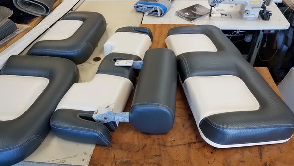 Moldable and durable yacht seating that will be used for storage on port as well