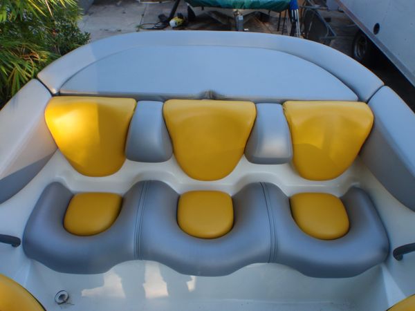 3 person yellow and silver marine boat passenger seating