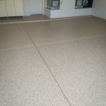 Tan flaked epoxy residential garage