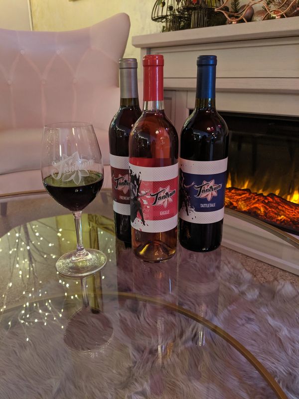 Three bottles and a cozy fireplace

