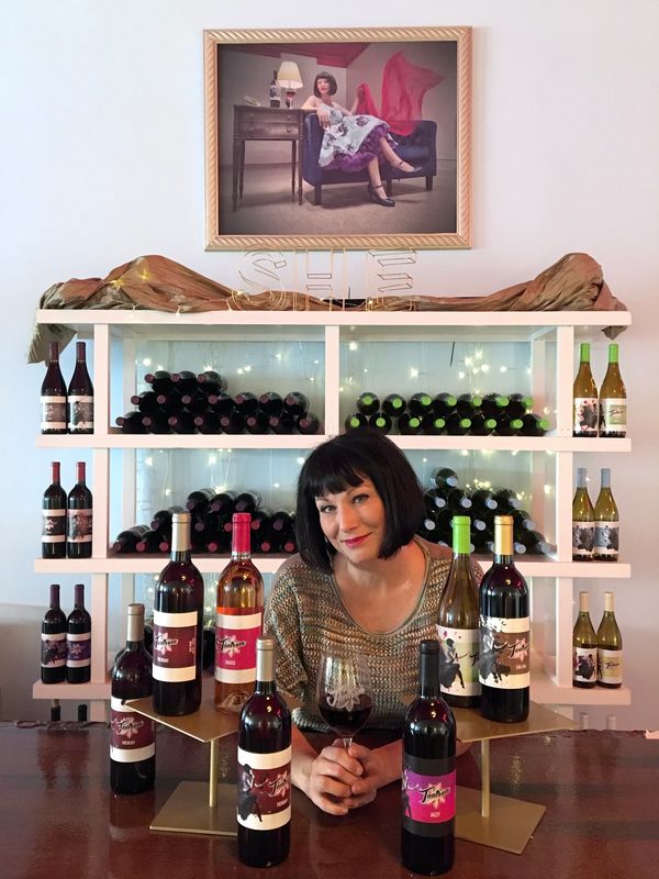 A woman with bottles 