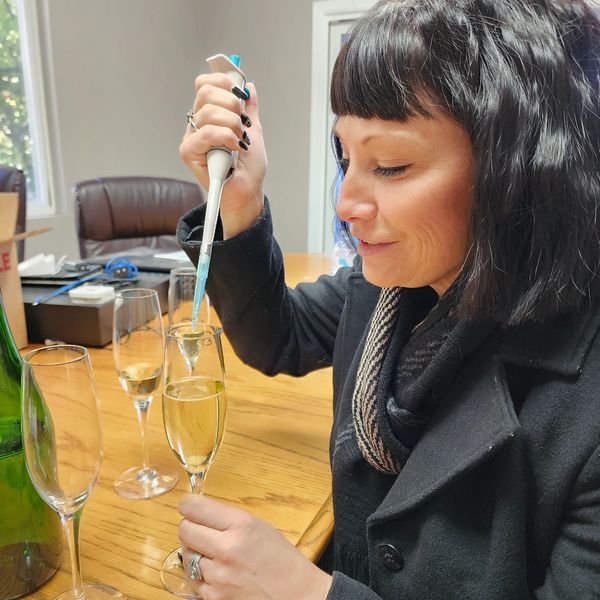 A woman with wine glass