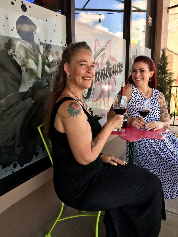 A woman drinking a wine