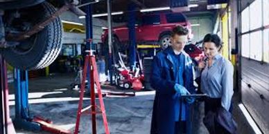 auto repair shop with mechanic and customer
garage liability insurance
garage keepers insurance

