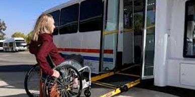 woman in wheelchair getting on bus
non emergency medical transport insurance
paratransit insurance
