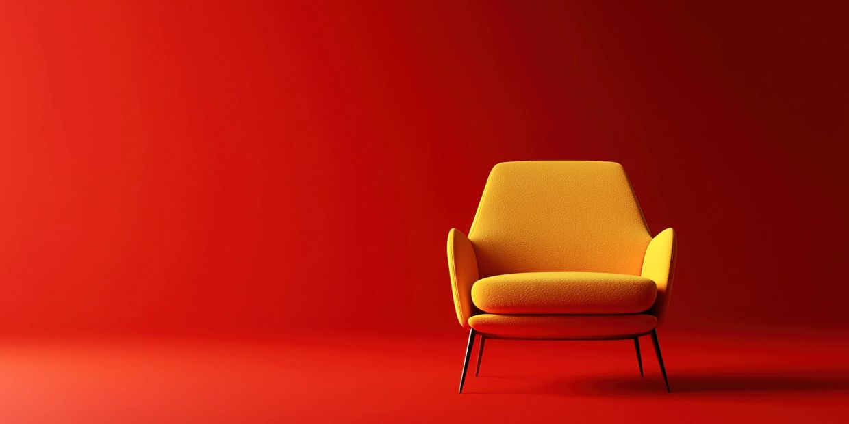 Yellow chair on a red background.