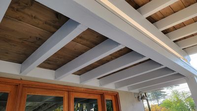 Redlands CA white wood beam with stained lid patio cover