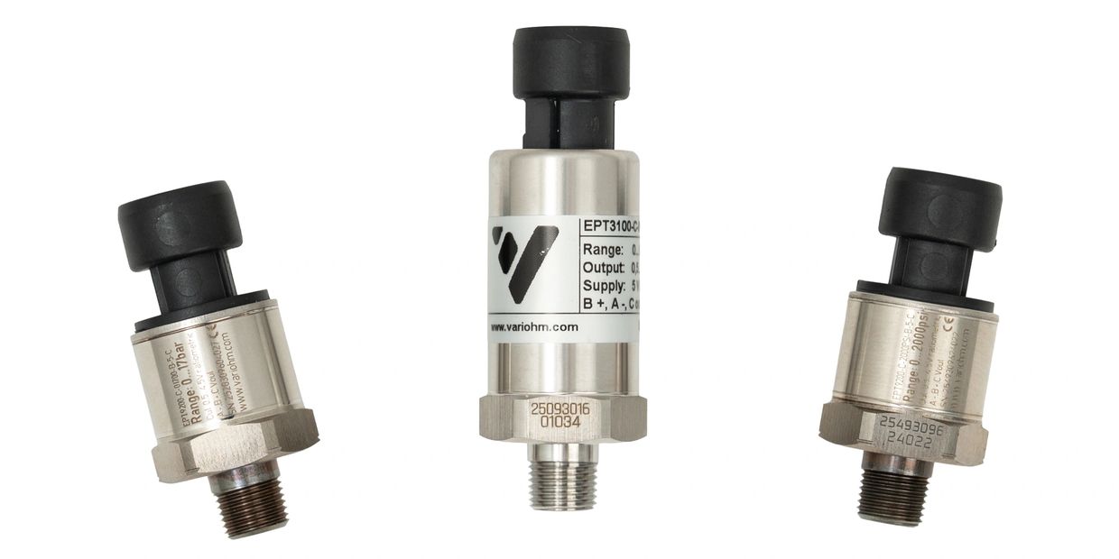 Three cylindrical pressure sensors with metal bodies and black plastic tops.