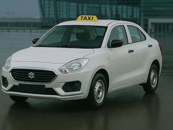 White taxi parked outside an airport promoting comfortable transfers with spacious vehicles, punctual service, and professional drivers.