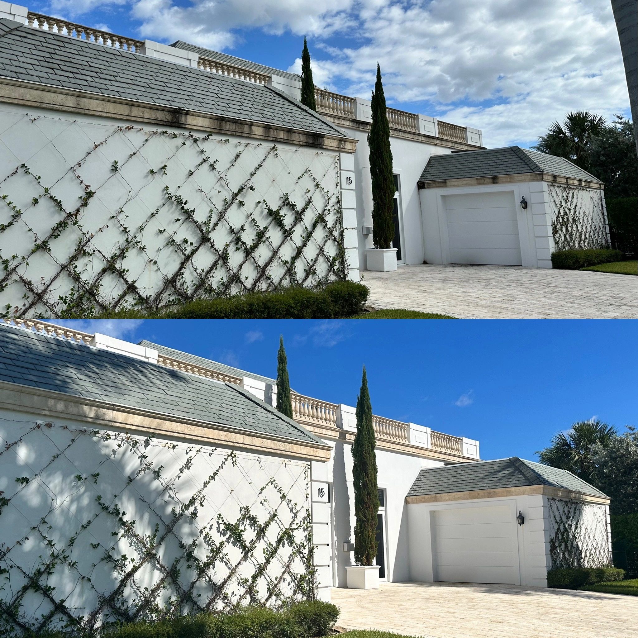 Elegant white house with climbing plants and a garage under a partly cloudy sky.