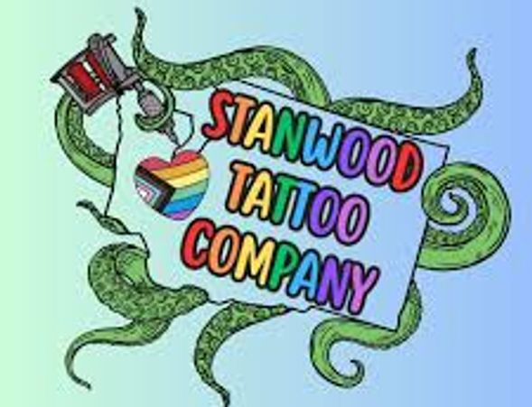 Colorful logo of Stanwood Tattoo Company with octopus tentacles and a rainbow heart.