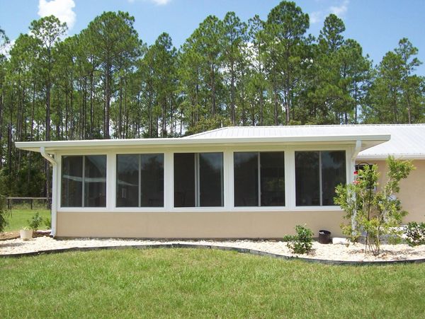 Glass Room with Insulated Patio Roof.