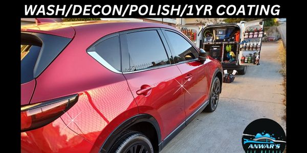 Shiny red car after wash, decon, polish, and coating.