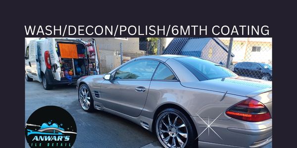 Clean silver luxury convertible with shiny rims.