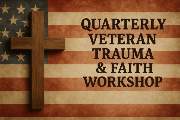 Wooden cross on vintage American flag with veteran trauma workshop text.