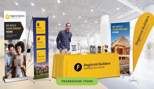 Group of printed tradeshow items: sign, flag, banner and tablecover