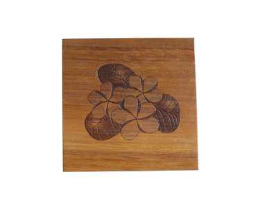 Koa coaster engraved with three plumeria