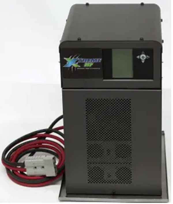 A black electronic device with cables and a small screen.