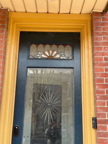 Floral design for transom that sits in a channel at the top of the front door. 
