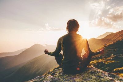 Man meditating and peaceful