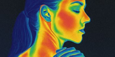 Thermal image of a woman showing heat distribution on her face and neck.