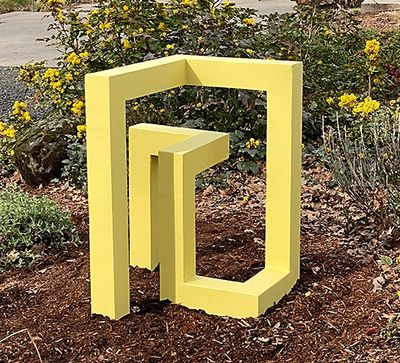 Wood sculpture with a ridged membrane exoshell.