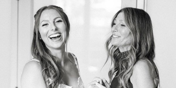Mother and daughter laughing