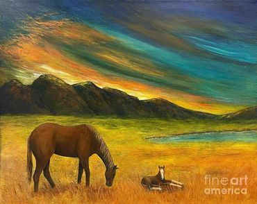 Mare and foal sunset landscape 