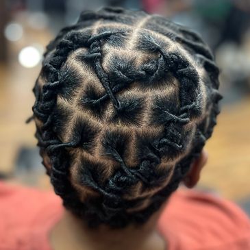Starter Locs styled into a heart