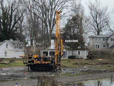 Flooded property drilling monitoring wells in Crystal Beach