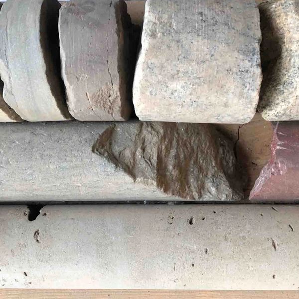 Rock core samples that have been drilled by Jeremy Fee from 20 years of experience in drilling.