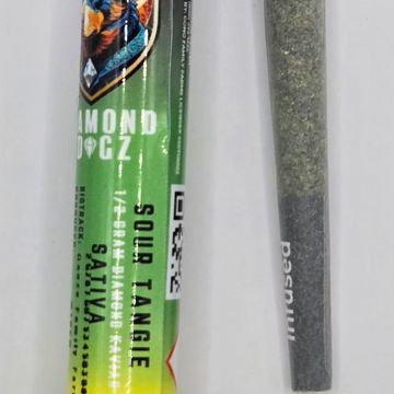 Diamond OGz Sativa pre-roll and joint on a white surface.